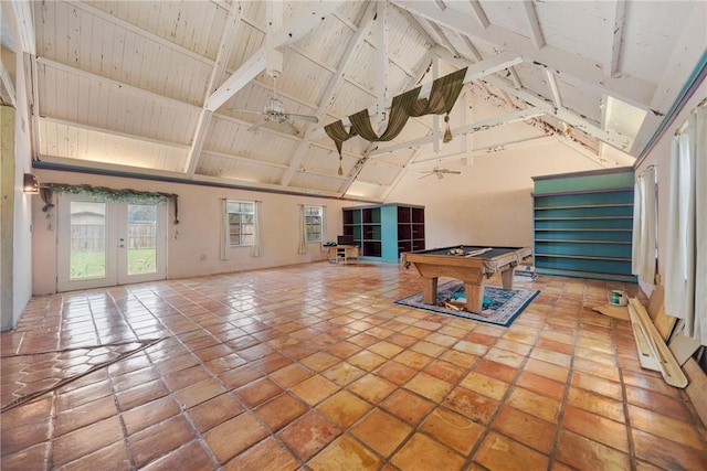 interior space featuring ceiling fan, french doors, lofted ceiling with beams, and pool table