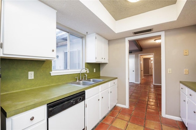 kitchen with dishwasher, white cabinetry, and sink