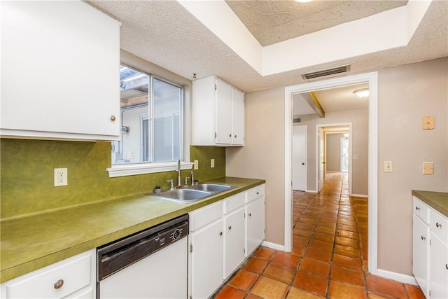 41 Townhouse, Corpus Christi, TX 78412 - kitchen with dishwasher, a sink, decorative backsplash, white cabinetry, and baseboards