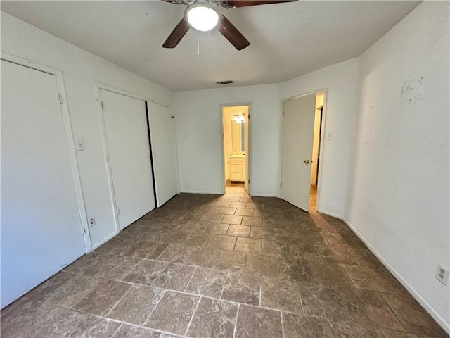 unfurnished bedroom with ceiling fan