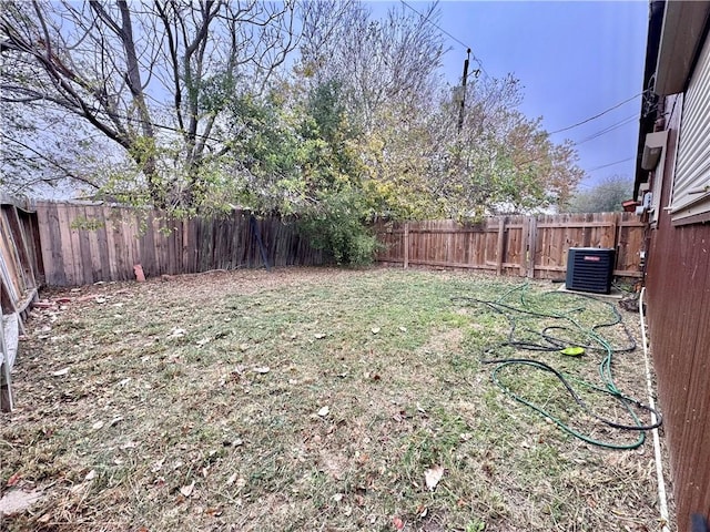 view of yard featuring central AC