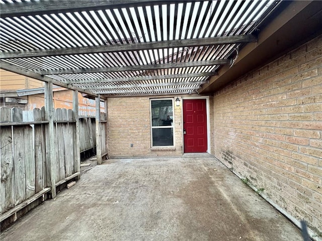 view of patio featuring a pergola