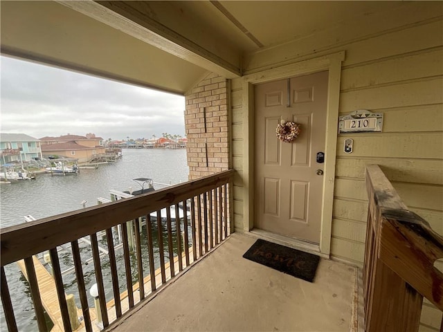 property entrance with a water view