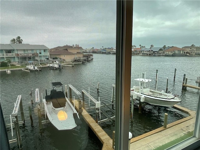 dock featuring a water view and boat lift
