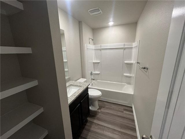 7201 Wilder Ln, Corpus Christi, TX 78414 - bathroom featuring vanity, shower / bathtub combination, and wood finished floors