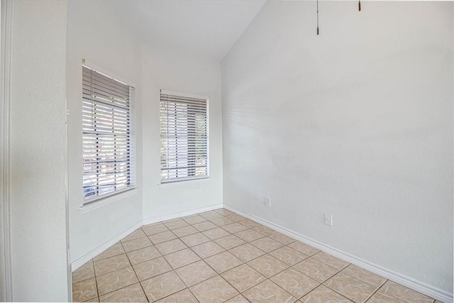 spare room featuring light tile patterned floors