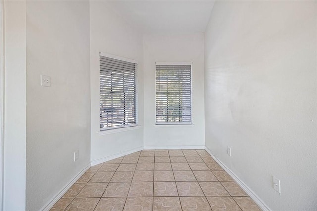 empty room featuring light tile patterned floors