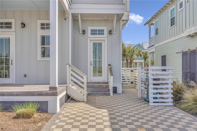 property entrance with board and batten siding