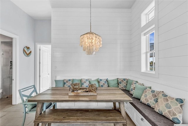 dining room with breakfast area and a chandelier