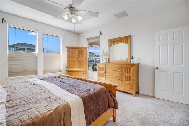637 Pompano Dr, Aransas Pass, TX 78336 - bedroom featuring light carpet and a ceiling fan
