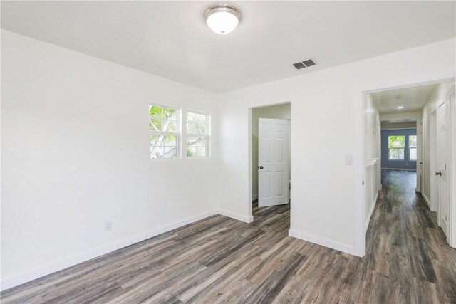 1336 Brentwood Dr, Corpus Christi, TX 78415 - unfurnished room featuring wood finished floors and baseboards