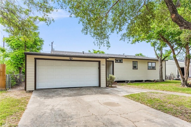 1336 Brentwood Dr, Corpus Christi, TX 78415 - ranch-style house featuring driveway and an attached garage
