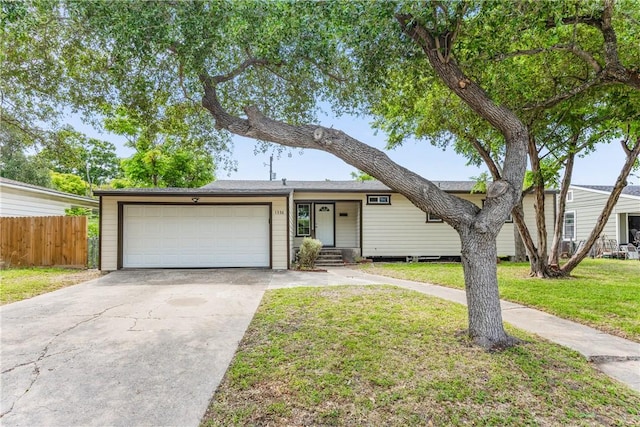 1336 Brentwood Dr, Corpus Christi, TX 78415 - view of front of property with a garage and driveway