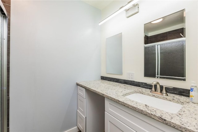 1336 Brentwood Dr, Corpus Christi, TX 78415 - bathroom with vanity and a shower with shower door