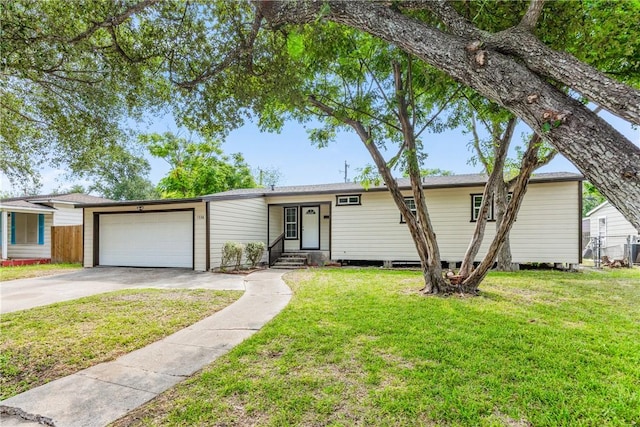 1336 Brentwood Dr, Corpus Christi, TX 78415 - single story home with concrete driveway, an attached garage, cooling unit, and entry steps