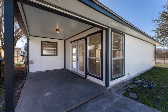 view of patio / terrace with fence and french doors