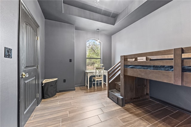 bedroom featuring a tray ceiling