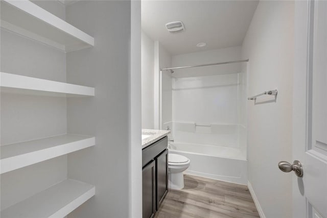 2721 Excelsior Blvd, Corpus Christi, TX 78415 - bathroom with wood finished floors, vanity, and shower / washtub combination
