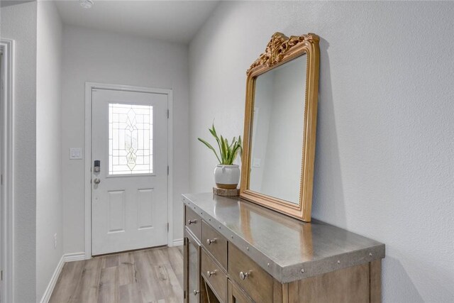 2721 Excelsior Blvd, Corpus Christi, TX 78415 - doorway featuring light wood-style floors and baseboards