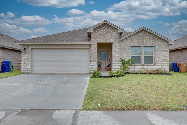 2721 Excelsior Blvd, Corpus Christi, TX 78415 - ranch-style home featuring brick siding, driveway, an attached garage, and a front yard