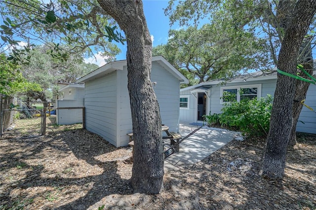 19 Estates Dr, Rockport, TX 78382 - view of front facade with fence and a patio
