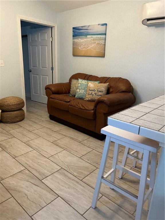 living room with a wall unit AC