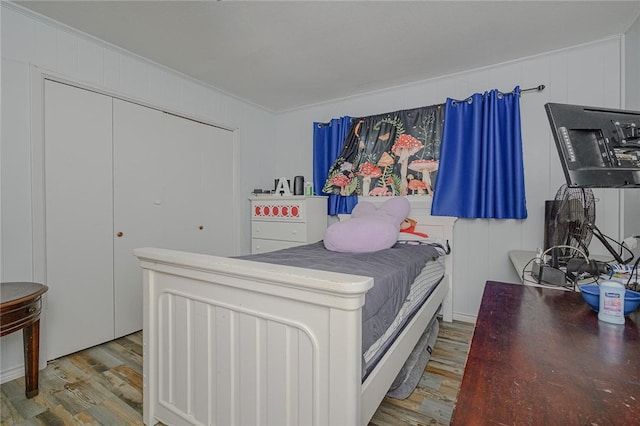 19 Estates Dr, Rockport, TX 78382 - bedroom with wood finished floors and ornamental molding