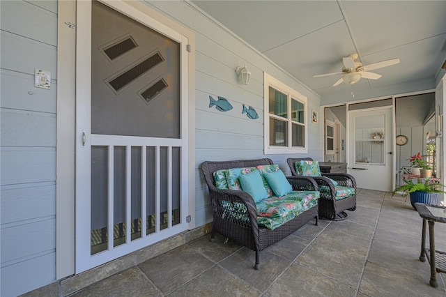 view of patio with ceiling fan and outdoor lounge area