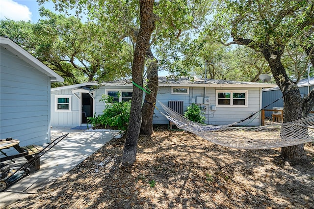 back of house with a patio area