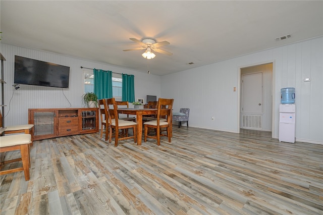 dining room featuring ceiling fan and light hardwood / wood-style flooring