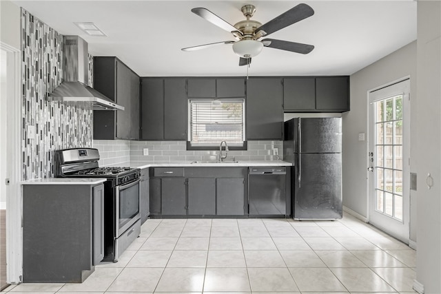 4122 Barnes St, Corpus Christi, TX 78411 - kitchen featuring black appliances, island exhaust hood, tasteful backsplash, and light countertops