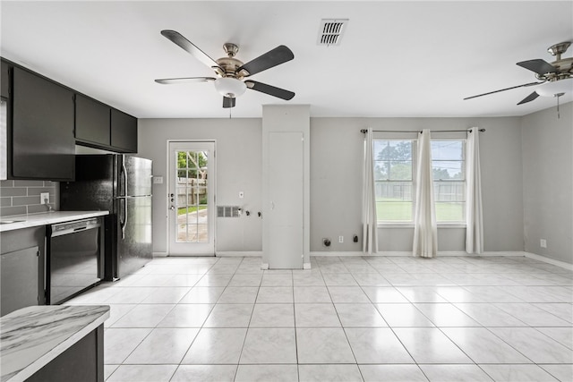 4122 Barnes St, Corpus Christi, TX 78411 - kitchen featuring ceiling fan, dishwasher, light countertops, tasteful backsplash, and dark cabinetry