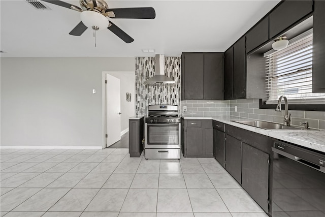 4122 Barnes St, Corpus Christi, TX 78411 - kitchen featuring dishwashing machine, stainless steel gas stove, wall chimney exhaust hood, light countertops, and decorative backsplash