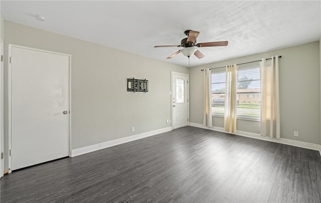 4122 Barnes St, Corpus Christi, TX 78411 - unfurnished room with a ceiling fan, dark wood-style floors, and a smoke detector
