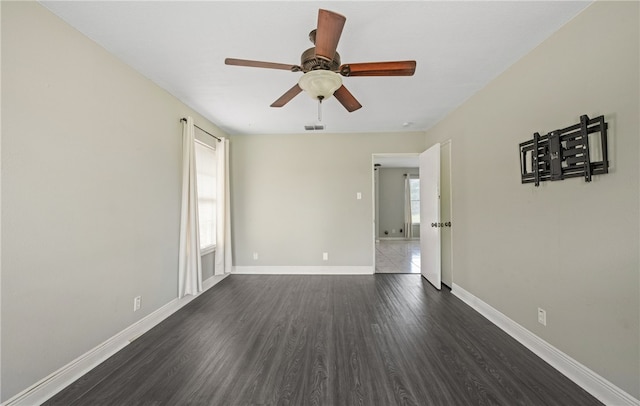 4122 Barnes St, Corpus Christi, TX 78411 - spare room featuring dark wood-style floors and a ceiling fan