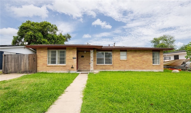 4122 Barnes St, Corpus Christi, TX 78411 - ranch-style house featuring brick siding