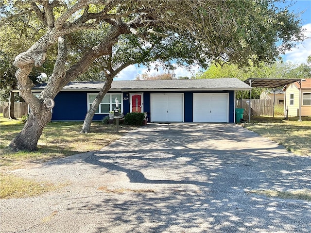 single story home featuring a garage