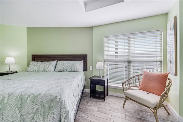 1923 S 11th St Unit 1, Port Aransas, TX 78373 - bedroom with wood finished floors and baseboards