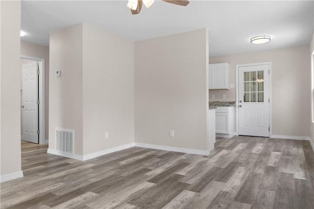 4649 Dodd Dr, Corpus Christi, TX 78415 - unfurnished room featuring a ceiling fan and light wood finished floors