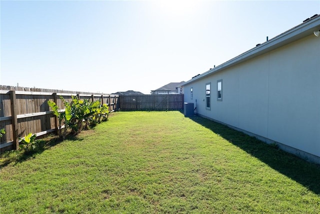 view of yard featuring central AC