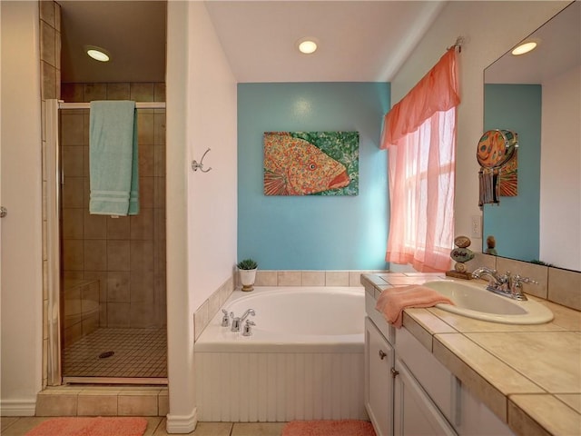 bathroom featuring vanity, separate shower and tub, and tile patterned flooring