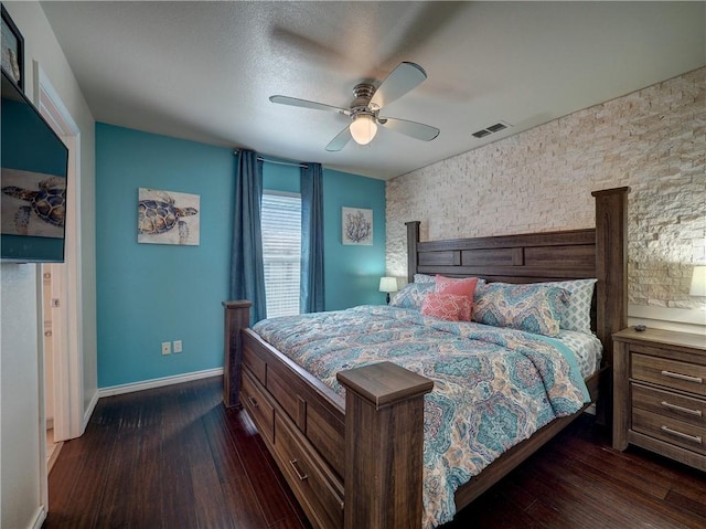 bedroom with dark wood-type flooring and ceiling fan