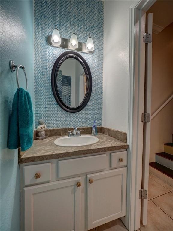 bathroom featuring vanity and tile patterned flooring