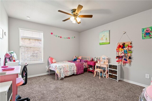 7706 Iron Man, Corpus Christi, TX 78414 - carpeted bedroom with ceiling fan and baseboards