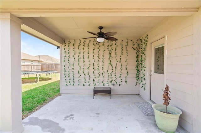 7706 Iron Man, Corpus Christi, TX 78414 - view of patio featuring a trampoline, fence, and a ceiling fan