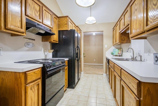 kitchen with brown cabinets, light countertops, black electric range, under cabinet range hood, and a sink