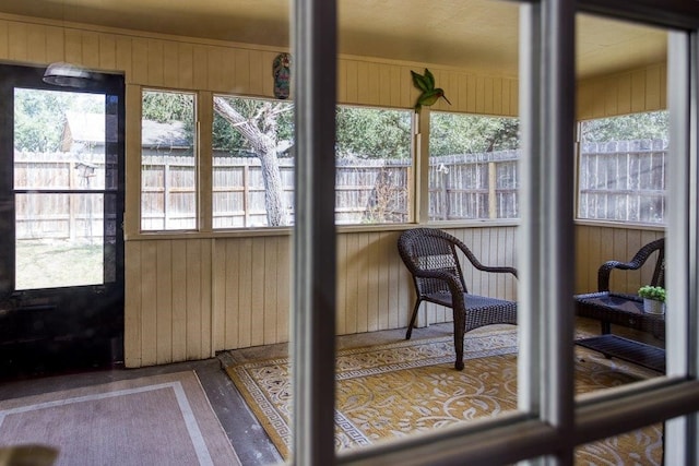 sunroom / solarium featuring a wealth of natural light