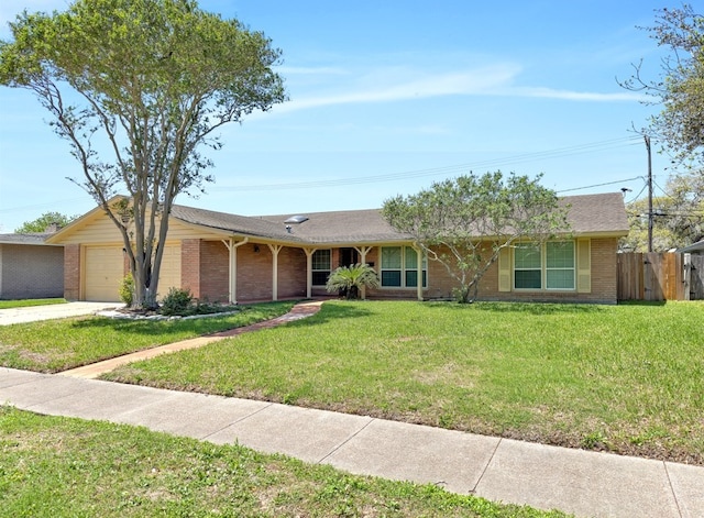 single story home with concrete driveway, brick siding, fence, and an attached garage