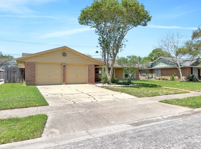 ranch-style home featuring a garage, brick siding, fence, and a front lawn