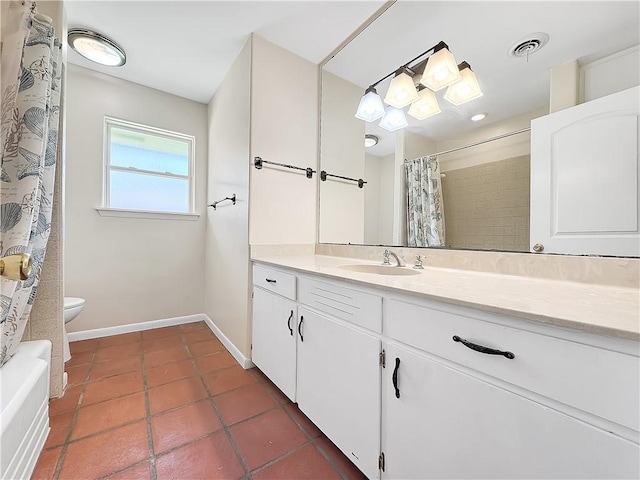 full bath with vanity, baseboards, tile patterned flooring, toilet, and visible vents